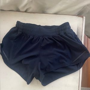 Navy blue Lululemon Hotty Totty 2.5 inch shorts size 4.